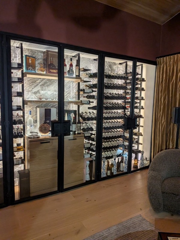 Glass-front wine cellar cabinets in an Orange County home
